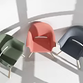 Stylish Leisure Chairs Green Pink And Dark Blue With Wooden Legs Against White Wall Background