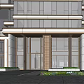 Modern Building Exterior With Large Glass Windows Stone Cladding Entrance And Lawn Greenery