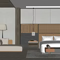 Hotel Guest Room Interior With King Bed Woven Headboard Sofa Chair And Wooden Flooring