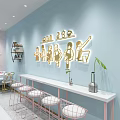 Cozy Milk Tea Shop Interior With Light Blue Walls Hanging TVs And Bar Style Seating
