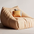 Plush Beige Single Sofa with Wrinkled Design Yellow Pillows in Light Wall Wooden Floor Interior