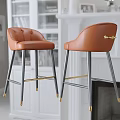 Stylish Brown Leather Bar Stools Featuring Black And Gold Legs Metal Accents