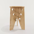 Handmade Wooden Stool With Natural Wood Grain And Rope Accents On Carved Legs