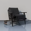 Modern Black Hinged Door Design With Armchair And Stack Of Books