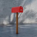 Red Commercial Mailbox with U.S. MAIL Sign on Wooden Post Against Gray Brick Wall
