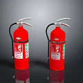 Two Red Fire Extinguishers With Silver Handles And Safety Labels On Black Surface