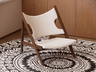 Modern Wooden Frame Accent Chair With White Upholstered Seat On Black And White Patterned Rug 3d model