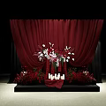 Stunning Wedding Decoration On Black Stage With Red Curtains White Flowers And Candles