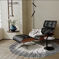 Black Leather Recliner Chair With Ottoman White Blanket Floor Lamp Round Rug On Wooden Floor