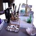 Light Purple Dressing Table With Round Mirror Cosmetics On Tray Wooden Chair And Green Plant