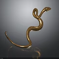 Golden Snake Sculpture With Curved Body On Dark Background With Reflection