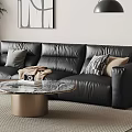 Black Leather Sofa With Pillows Throw Blanket And Marble Coffee Table In Modern Living Room