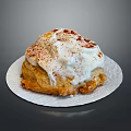 Freshly Baked Cinnamon Roll With Cream Cheese Frosting And Cinnamon Sprinkles