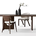 Modern Wooden Dining Table And Chair Set With Light Gray Cushions Decorative Vases And Branches