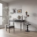 Elegant Black Dressing Table with Mirror Matching Stool and Wall Art Near Potted Plant