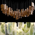 Modern Brown Square Chandelier with Transparent Elements and Green Leaf Background 3d model
