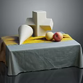 Still Life Arrangement With Cross Shaped Geometric Object Cone Apples And Tablecloth On Table