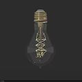 Transparent Glass Light Bulb With Golden Base And Filament On Dark Gray Background