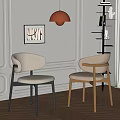 Modern Two Single Chairs With Beige Cushions Black Wooden Legs White Walls Orange Pendant Light