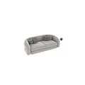 Modern Three Seater Sofa With Light Gray Upholstery And Patterned Cushions