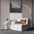 White Single Sofa With Tufted Design Arched Floor Lamp Abstract Painting And Small Round Table
