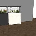 Two Fish Tanks With Black And White Cabinets Containing Fish And Aquatic Plants