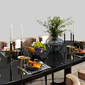 Modern Round Dining Table Set With Light Brown Chairs Green Plant Candles And Tableware