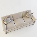 Elegant Beige Three Seater Sofa with Curved Arms and Patterned Decorative Pillows