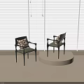 Black Armchair With Leopard Print Cushion And Armrest By Window Blinds On Round Platform