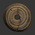 Circular Spiral Sculpture With Brown And Yellow Striped Textured Surface And Cracks