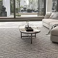 Modern Living Room Interior Coffee Table With Metal Frame Glass Top And Beige Sofa