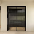 Modern Sliding Door With Black Frame And Glass Panels In White Wall Interior