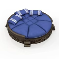 Traditional Circular Furniture With Blue Cushions And White Patterned Pillows On Dark Wooden Base