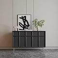 Modern Black Entryway Console Cabinet with Metal Legs and Decorative Plant Sculpture