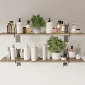 Bathroom Accessories Display On Wooden Shelves With Green Plants And Various Bottles