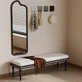 Indoor Corner Featuring Wall Mirror Hanging Decor Items And Bench With Brown Blanket 3d model