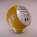 Yellow Round Design Portable Audio Speaker With Display Screen Control Buttons And Speaker Holes