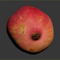 Fresh Red Orange Pomegranate With Speckled Skin On Dark Background