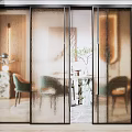 Modern Sliding Glass Doors With Black Frame Design In Interior Dining Space
