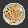 Assorted Shaped Cookies On White Plate With Leaf Flower And Animal Designs