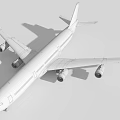 White Commercial Passenger Airplane Parked on Tarmac Under Cloudy Sky