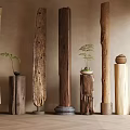Various Wooden Columns With Different Colors Textures And Small Plants On Decorative Bases