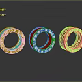 Three Colored Metallic Rings With Decorative Letters As Household Accessories