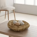 Nest Shaped Straw Decorative Ornament Set With White And Brown Eggs On Wooden Table