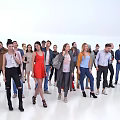 Group of Diverse People Standing in Various Casual Outfits on White Background