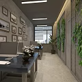 Modern Public Office Space With Desks Computers Framed Photos Green Plant Walls And Natural Light