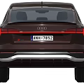 Audi Burgundy Modern SUV Coupe With Sleek Design LED Headlights And Alloy Wheels