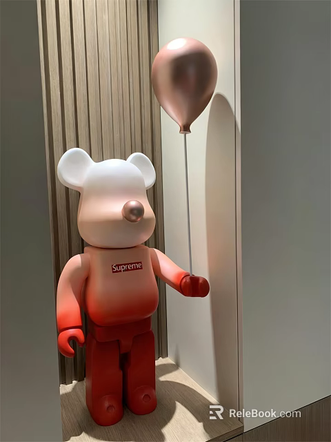 Artistic Bear Sculpture with Gradient White to Red Color Holding Balloon and Supreme Logo 3d model 