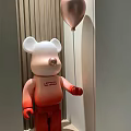 Artistic Bear Sculpture with Gradient White to Red Color Holding Balloon and Supreme Logo