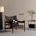 Tacchini Black Leather Lounge Chair With Wooden Frame Floor Lamp And Side Table Green Plant